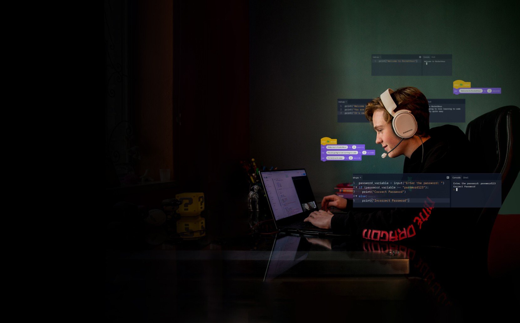 A RocketHour student coding at his computer in a dark room